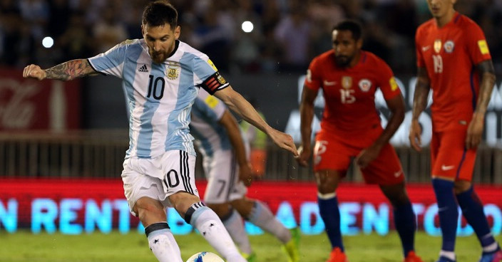 Argentina’s Lionel Messi takes a free-kick to score during a 2018 Russia World Cup qualifying soccer match between Argentina and Chile at the Monumental stadium in Buenos Aires, Argentina, Thursday March 23, 2017.((AP Photo/Agustin Marcarian)