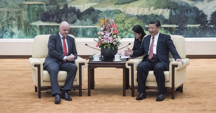 FIFA President Gianni Infantino, center left, meets with China's President Xi Jinping, center right, at the Great Hall of the People in Beijing on Wednesday, June 14, 2017. (Fred Dufour/Pool Photo via AP)
