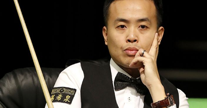 Marco Fu, from Hong Kong waits for his turn at the table during his game against Mei Xiwen, during day six of the UK Championships 2016 at the Barbican in York, England, Monday Nov. 28, 2016. (Martin Rickett / PA via AP)