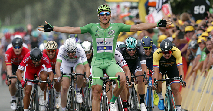 Germany's Marcel Kittel, wearing the best sprinter's green jersey celebrates as he crosses the finish line to win the tenth stage of the Tour de France cycling race over 178 kilometers (110.6 miles) with start in Perigueux and finish in Bergerac, France, Tuesday, July 11, 2017. (AP Photo/Christophe Ena)