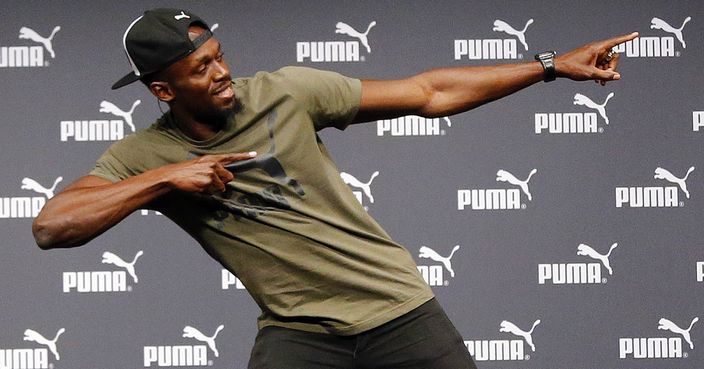 Jamaican athlete Usain Bolt celebrates after a press conference ahead of the World Athletics championships in London, Tuesday, Aug. 1, 2017. Sprint legend Bolt, a multiple Olympic and World Championship gold medallist, is set to retire after the World Championships in London, which begin on Friday Aug. 4.(AP Photo/Frank Augstein)