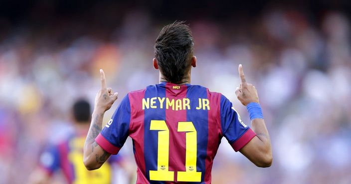 FILE- In this Saturday, May 9, 2015 file photo, FC Barcelona's Neymar celebrates after scoring against Real Sociedad during a Spanish La Liga soccer match at the Camp Nou stadium in Barcelona, Spain. Barcelona said Wednesday, Aug. 2, 2017, Neymar's 222 million euro ($262 million) release clause must be paid in full if the Brazil striker wants to leave. (AP Photo/Manu Fernandez, File)