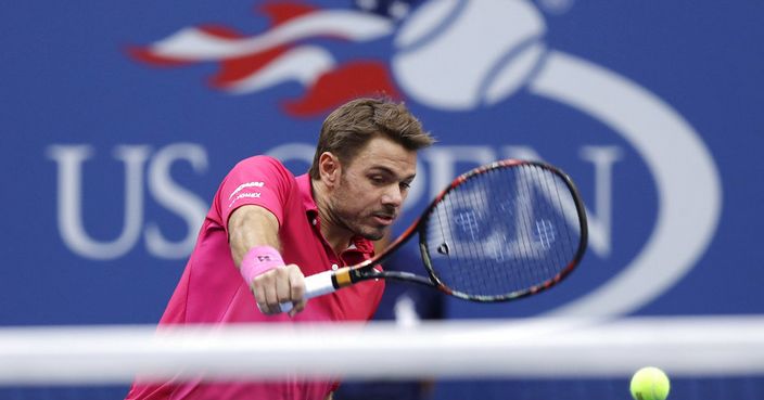 FILE - In this Sept. 11, 2016, file photo, Stan Wawrinka, of Switzerland, returns a shot to Novak Djokovic, of Serbia, during the men's singles final at the U.S. Open tennis tournament, in New York. Defending champion Stan Wawrinka has pulled out of the U.S. Open with an injured knee. Wawrinka announced Friday, Aug. 4, 2017, he would sit out the rest of 2017 because of the knee. (AP Photo/Charles Krupa, File)