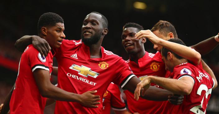 Manchester United's Romelu Lukaku, second left, celebrates scoring his side's first goal of the game during the English Premier League soccer match between Manchester United and West Ham United at Old Trafford in Manchester, England, Sunday, Aug. 13, 2017. (AP Photo/Dave Thompson)