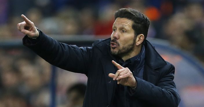 Atletico's coach Diego Simeone gives directions to his players during the Champions League 2nd leg quarterfinal soccer match between Atletico Madrid and Barcelona at the Vicente Calderon stadium in Madrid, Spain, Wednesday April 13, 2016. (AP Photo/Francisco Seco)