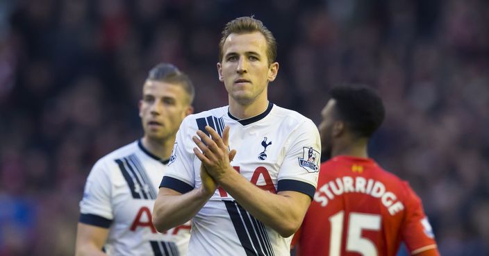 Tottenham's Harry Kane, centre, applauds supporters after his team drew 1-1 in the English Premier League soccer match between Liverpool and Tottenham Hotspur, at Anfield Stadium, in  Liverpool, England, Saturday, April 2, 2016. (AP Photo/Jon Super)