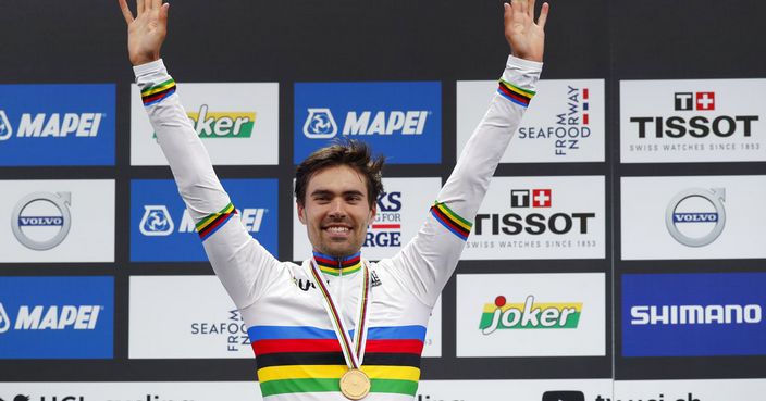 World Champion and gold medalist Tom Dumoulin from The Netherlands on the podium during the UCI Cycling Road World Championships men elite individual time trial in Bergen, Norway, Wednesday Sept. 20, 2017. (Cornelius Poppe/NTB scanpix via AP)