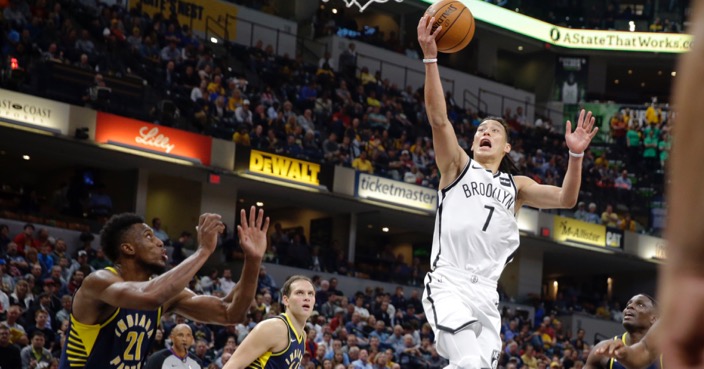 Brooklyn Nets guard Jeremy Lin (7) shoots over Indiana Pacers forward Thaddeus Young (21) during the second half of an NBA basketball game in Indianapolis, Wednesday, Oct. 18, 2017. The Pacers defeated the Nets 140-131 (AP Photo/Michael Conroy)
