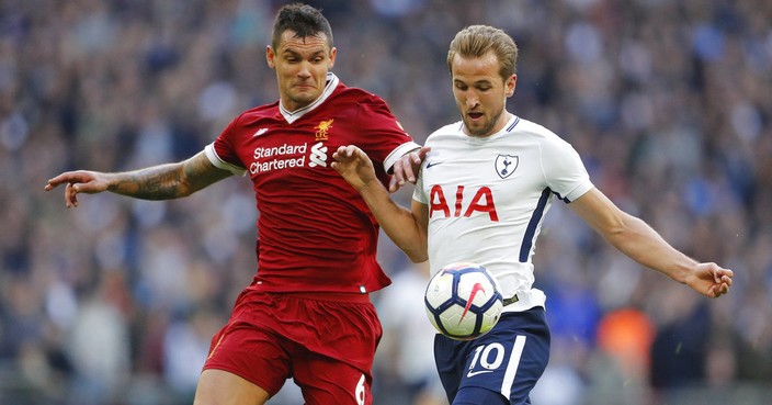 Tottenham's Harry Kane, right, and Liverpool's Dejan Lovren challenge for the ball during the English Premier League soccer match between Tottenham Hotspur and Liverpool at Wembley Stadium in London, Sunday, Oct. 22, 2017.(AP Photo/Frank Augstein)
