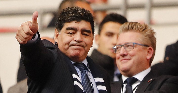 Argentina soccer legend Diego Armando Maradona arrives to watch the English Premier League soccer match between Tottenham Hotspur and Liverpool at Wembley Stadium in London, Sunday, Oct. 22, 2017.(AP Photo/Frank Augstein)