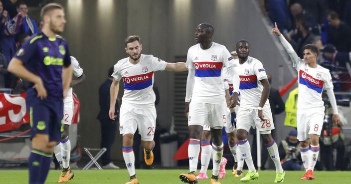 Lyon players celebrate their victory during the Europa League Group E soccer match between Lyon and Everton at the Lyon stadium in Decines, near Lyon, France, Thursday, Nov. 2, 2017. (AP Photo/Laurent Cipriani)