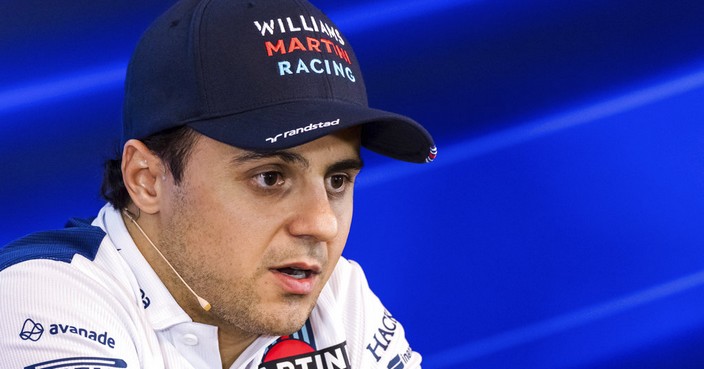 FILE - In this Thursday, Aug. 24, 2017 file photo, Williams driver Felipe Massa of Brazil speaks during a media conference at the Belgian Formula One Grand Prix in Spa-Francorchamps, Belgium. Formula One driver Felipe Massa will retire at the end of the season, it was announced on Saturday, Nov. 4, 2017. The 36-year-old Brazilian driver was originally going to retire from the Williams team last season, but changed his mind after Valtteri Bottas suddenly left Williams to join Mercedes. (AP Photo/Geert Vanden Wijngaert, file)