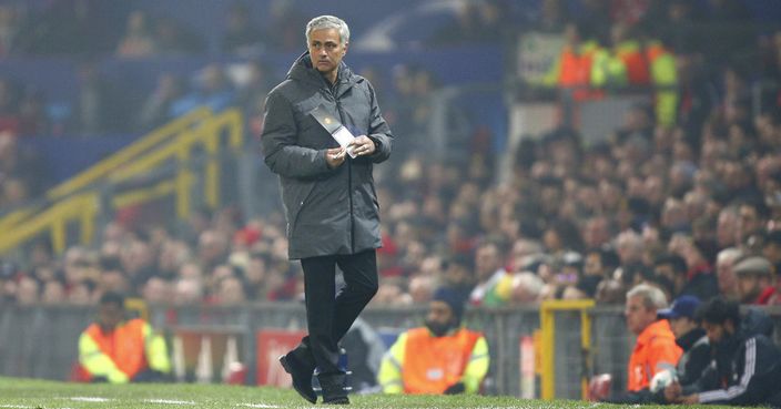 Manchester United coach Jose Mourinho holds a notebook during the Champions League group A soccer match between Manchester United and Benfica, at Old Trafford, in Manchester, England, Tuesday, Oct. 31, 2017. (AP Photo/Dave Thompson)