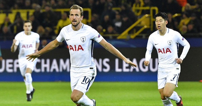 Tottenham's Harry Kane celebrates after scoring his side's opening goal during the soccer Champions League group H match between Borussia Dortmund and Tottenham Hotspur in Dortmund, Germany, Tuesday, Nov. 21, 2017. (AP Photo/Martin Meissner)