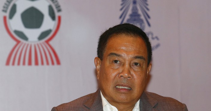 Football Association of Thailand President Somyot Poompanmuang talks to reporters during a press conference in Bangkok, Thailand, Tuesday, Nov. 21, 2017.  Somyot said five players and two match officials from the top-flight national league are among the 12 people arrested for alleged match fixing. (AP Photo/Sakchai Lalit)