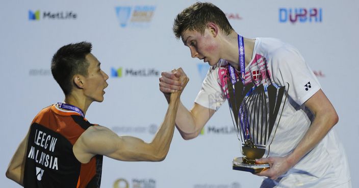 Denmark's Viktor Axelsen, right, shakes hands with Lee Chong Wei of Malaysia after a final match of the Dubai Badminton World Superseries Finals in Dubai, United Arab Emirates, Sunday, Dec. 17, 2017. (AP Photo/Kamran Jebreili)