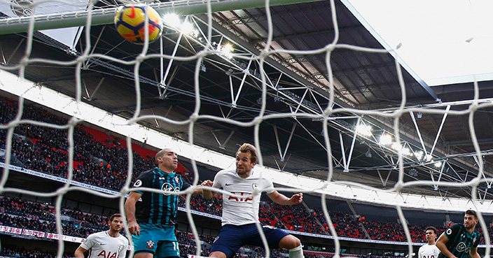LONDON, ENGLAND - DECEMBER 26:  Harry Kane of Spurs scores the opening goal with a header to go past Alan Shearers calendar year scoring record during the Premier League match between Tottenham Hotspur and Southampton at Wembley Stadium on December 26, 2017 in London, England.  (Photo by Julian Finney/Getty Images)