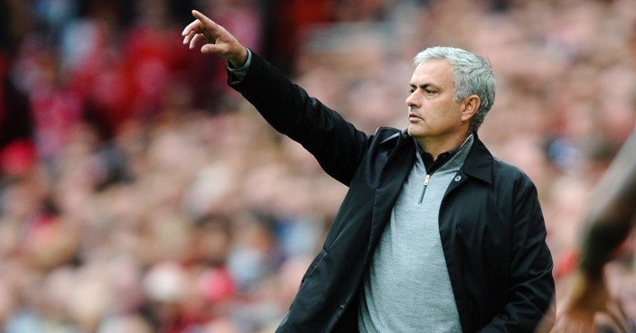 Manchester United coach Jose Mourinho reacts on the sidelines during the English Premier League soccer match between Liverpool and Manchester United at Anfield, Liverpool, England, Saturday, Oct. 14, 2017. (AP Photo/Rui Vieira)