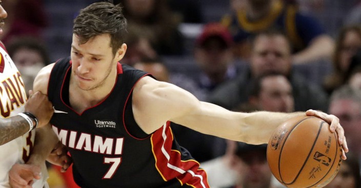 Miami Heat's Goran Dragic (7), from Slovenia, drives past Cleveland Cavaliers' Isaiah Thomas (3) in the first half of an NBA basketball game, Wednesday, Jan. 31, 2018, in Cleveland. (AP Photo/Tony Dejak)