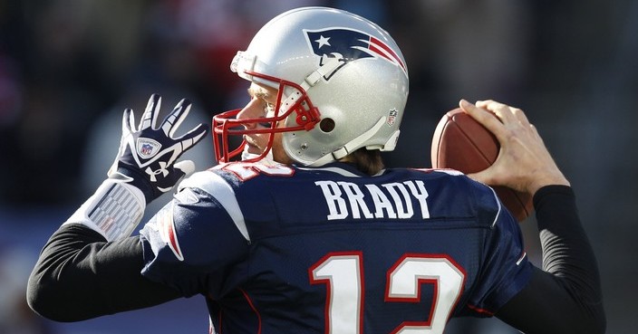 New England Patriots quarterback Tom Brady (12) in the first half of an NFL football game against the Miami Dolphins in Foxborough, Mass., Saturday Dec. 24, 2011. (AP Photo/Charles Krupa)