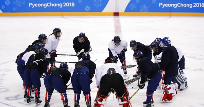The joint Korean women's ice hockey players gather on the ice during a training session prior to the 2018 Winter Olympics in Gangneung, South Korea, Monday, Feb. 5, 2018. (AP Photo/Jae C. Hong)