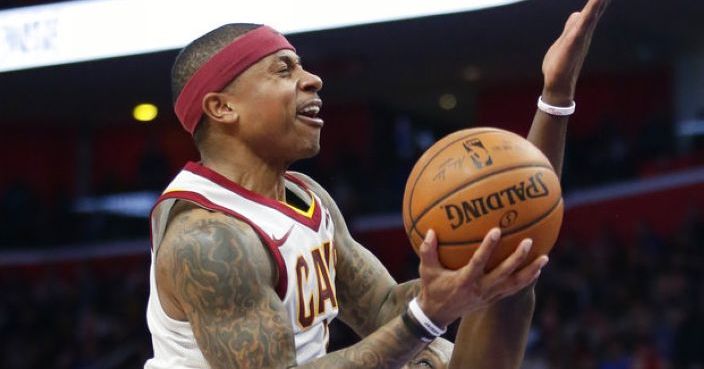 Cleveland Cavaliers guard Isaiah Thomas, left, goes to the basket against Detroit Pistons forward Anthony Tolliver during the second half of an NBA basketball game Tuesday, Jan. 30, 2018, in Detroit. The Pistons defeated the Cavaliers 125-114. (AP Photo/Duane Burleson)