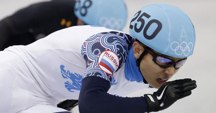 Victor An of Russia competes in the men's 5000m short track speedskating relay final at the Iceberg Skating Palace during the 2014 Winter Olympics, Friday, Feb. 21, 2014, in Sochi, Russia. (AP Photo/Darron Cummings)