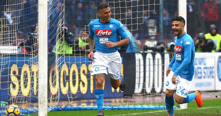 Napoli's Allan, left, celebrates after scoring his side first goal during a Serie A soccer match between Napoli and Spal at Naples' San Paolo stadium, Italy, Sunday, Feb.18, 2018. (Cesare Abbate/ANSA via AP)