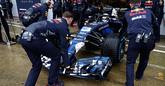 NORTHAMPTON, ENGLAND - FEBRUARY 19:  Daniel Ricciardo of Australia prepares to drive the (3) Aston Martin Red Bull Racing Red Bull RB14 TAG Heuer during the Aston Martin Red Bull Racing RB14 Special Edition filming day at Silverstone Circuit on February 19, 2018 in Northampton, England.  (Photo by Mark Thompson/Getty Images)