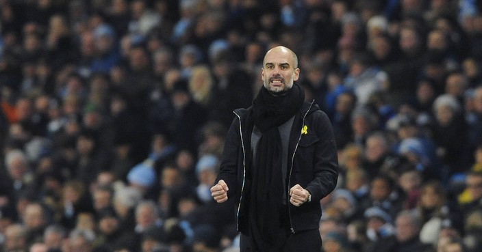 Manchester City coach Pep Guardiola reacts during the English Premier League soccer match between Manchester City and Newcastle United at the Etihad Stadium in Manchester, England, Saturday, Jan. 20, 2018. (AP Photo/Rui Vieira)
