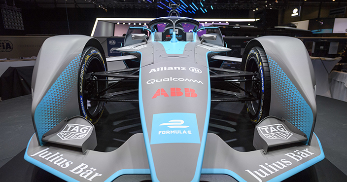 The New FIA Formula E is presented during the press day at the 88th Geneva International Motor Show in Geneva, Switzerland, Tuesday, March 6, 2018. The Motor Show will open its gates to the public from March 8 to  March 18 presenting more than 180 exhibitors and more than 110 world and European premieres. (Martial Trezzini/Keystone via AP)