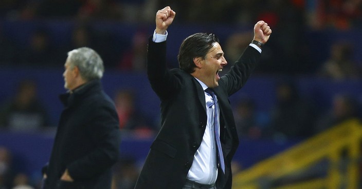 Sevilla's head coach Vicenzo Montella celebrates after his sides scored their second goal of the game during the Champions League round of 16 second leg soccer match between Manchester United and Sevilla, at Old Trafford in Manchester, England, Tuesday, March 13, 2018. (AP Photo/Dave Thompson)