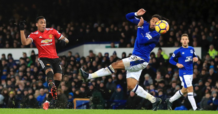 Manchester United's Anthony Martial scores his side's first goal of the game during the Premier League match at Goodison Park, Liverpool. PRESS ASSOCIATION Photo. Picture date: Monday January 1, 2018. See PA story SOCCER Everton. Photo credit should read: Peter Byrne/PA Wire. RESTRICTIONS: EDITORIAL USE ONLY No use with unauthorised audio, video, data, fixture lists, club/league logos or 