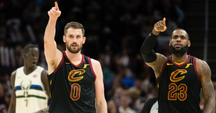 CLEVELAND, OH - MARCH 19: Kevin Love #0 and LeBron James #23 of the Cleveland Cavaliers celebrate after a teammate scored during the second half against the Milwaukee Bucks at Quicken Loans Arena on March 19, 2018 in Cleveland, Ohio. The Cavaliers defeated the Bucks 124-117. NOTE TO USER: User expressly acknowledges and agrees that, by downloading and or using this photograph, User is consenting to the terms and conditions of the Getty Images License Agreement. (Photo by Jason Miller/Getty Images) *** Local Caption *** LeBron James; Kevin Love