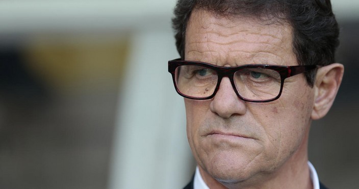 FILE - In this June 14, 2015 file photo, Russia's coach Fabio Capello watches his players during the Euro 2016 qualifying soccer match between Russia and Austria, in Moscow, Russia. Capello, winner of the UEFA Champions League in 1994 and who also led the national teams of England and Russia to the 2010 and 2014 World Cups, was appointed as head coach of Jiangsu Suning in June. (AP Photo/Ivan Sekretarev, File)