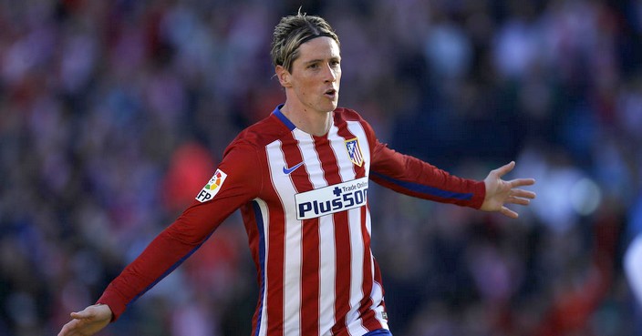 Atletico Madrid's Fernando Torres celebrates after scoring his side's second goal against Granada during the Spanish La Liga soccer match between Atletico Madrid and Granada at the Vicente Calderon stadium in Madrid, Sunday, April 17, 2016. (AP Photo/Francisco Seco)