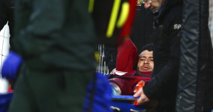 Liverpool's Alex Oxlade-Chamberlain is carried on a stretcher after getting injured during the Champions League semifinal, first leg, soccer match between Liverpool and AS Roma at Anfield Stadium, Liverpool, England, Tuesday, April 24, 2018. (AP Photo/Dave Thompson)