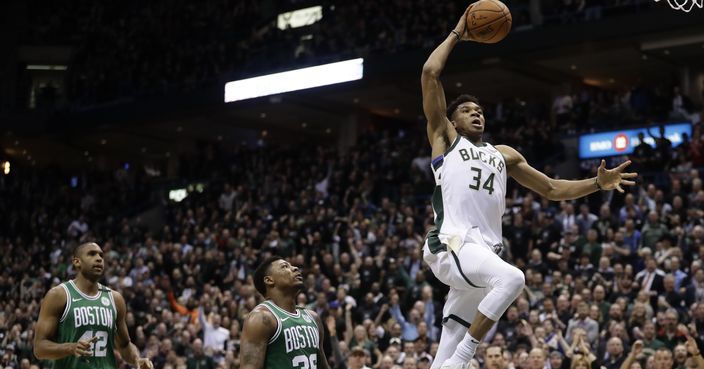 Milwaukee Bucks' Giannis Antetokounmpo dunks during the first half of Game 6 of an NBA basketball first-round playoff series against the Boston Celtics Thursday, April 26, 2018, in Milwaukee. (AP Photo/Morry Gash)
