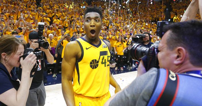 Utah Jazz guard Donovan Mitchell (45) celebrates after the team's 96-91 victory over the Oklahoma City Thunder during Game 6 of an NBA basketball first-round playoff series Friday, April 27, 2018, in Salt Lake City. The Jazz won the series. (AP Photo/Rick Bowmer)