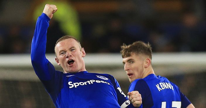 Everton's Wayne Rooney, left. celebrates scoring his side's third goal of the game during the English Premier League soccer match at Goodison Park in Liverpool, England, Wednesday Nov. 29, 2017. ( Byrne/PA via AP)