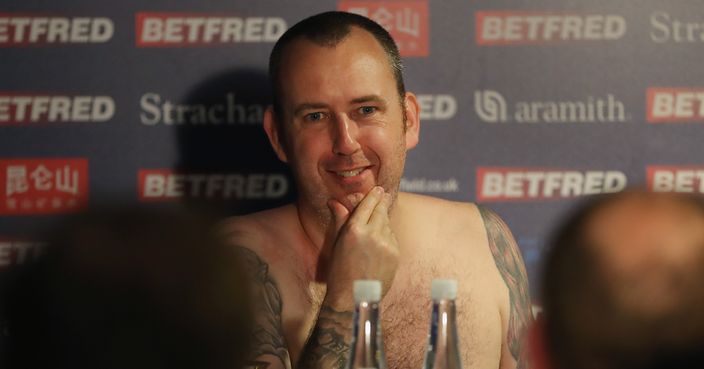 SHEFFIELD, ENGLAND - MAY 07:  Mark Williams of Wales speaks to the media naked during a press conference after winning the tournament during day seventeen of World Snooker Championship after winning the tournament at Crucible Theatre on May 7, 2018 in Sheffield, England.  (Photo by Linnea Rheborg/Getty Images)
