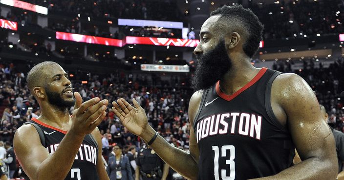 Houston Rockets guard Chris Paul (3) and James Harden celebrate the team's win over the Utah Jazz during Game 5 of an NBA basketball second-round playoff series, Tuesday, May 8, 2018, in Houston. (AP Photo/Eric Christian Smith)