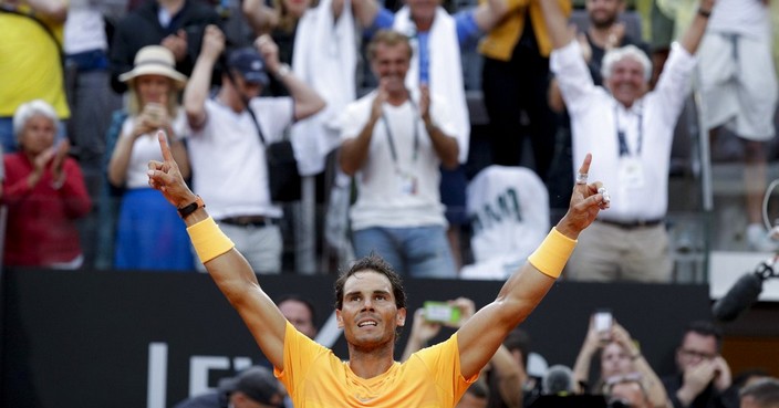 Spain's Rafael Nadal celebrates after beating Germany's Alexander Zverev in their final match at the Italian Open tennis tournament, in Rome, Sunday, May 20, 2018. Nadal won 6-1, 1-6, 6-3. (AP Photo/Gregorio Borgia)