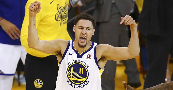 Golden State Warriors guard Klay Thompson (11) celebrates during the second half of Game 6 of the NBA basketball Western Conference Finals against the Houston Rockets in Oakland, Calif., Saturday, May 26, 2018. The Warriors won 115-86. (AP Photo/Ben Margot)