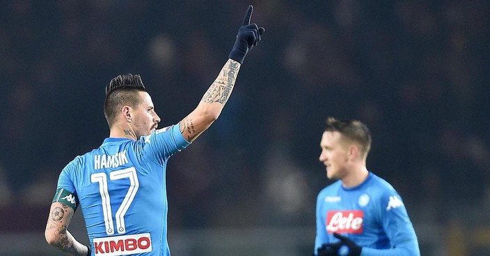 Napoli miedfielder Marek Hamsik celebrates after scoring his side's third goal during the Italian Serie A soccer match between Torino and Napoli at Olympic stadium in Turin, Italy, Saturday, Dec. 16, 2017. (Alessandro Di Marco/ANSA via AP)