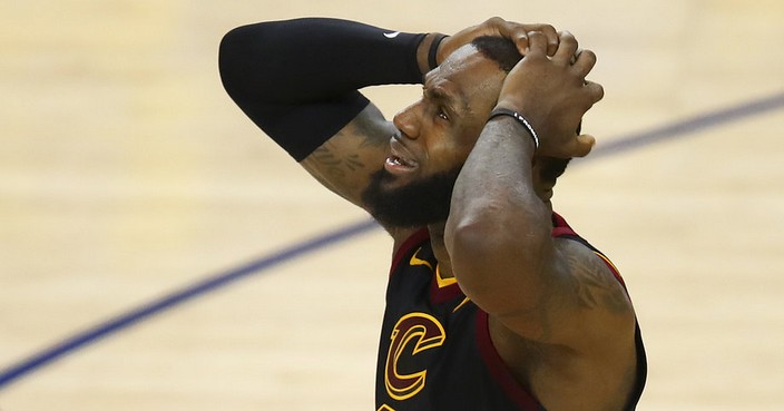 Cleveland Cavaliers forward LeBron James reacts to a call during the second half of Game 1 of basketball's NBA Finals between the Golden State Warriors and the Cavaliers in Oakland, Calif., Thursday, May 31, 2018. (AP Photo/Ben Margot)