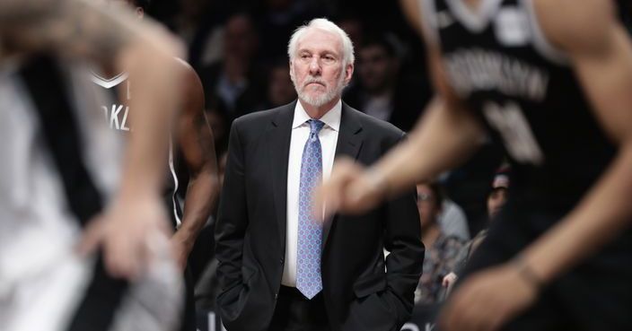 San Antonio Spurs head coach Gregg Popovich watches his team play during the first half of an NBA basketball game against the Brooklyn Nets Wednesday, Jan. 17, 2018, in New York. (AP Photo/Frank Franklin II)