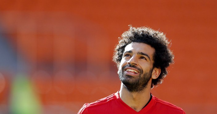 Egypt's Mohamed Salah smiles during Egypt's official training on the eve of the group A match between Egypt and Uruguay at the 2018 soccer World Cup in the Yekaterinburg Arena in Yekaterinburg, Russia, Thursday, June 14, 2018. (AP Photo/Natacha Pisarenko)