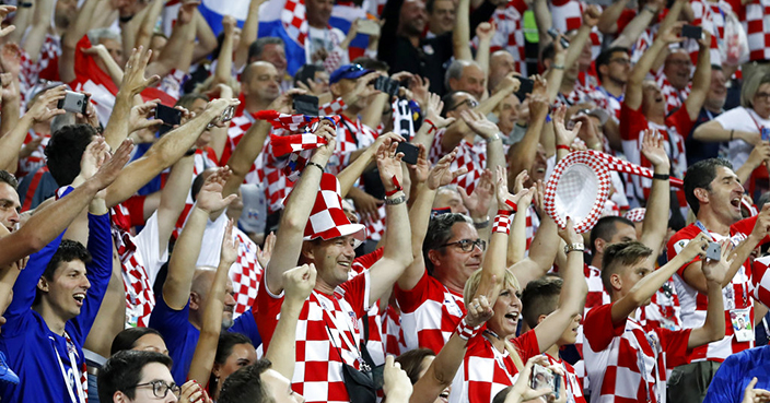 Croatia fans celebrate after winning the quarterfinal match between Russia and Croatia at the 2018 soccer World Cup in the Fisht Stadium, in Sochi, Russia, Saturday, July 7, 2018. (AP Photo/Rebecca Blackwell)