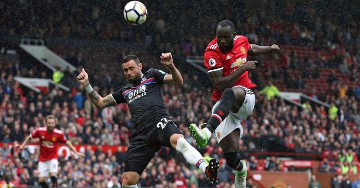 Manchester United's Romelu Lukaku (right) and Crystal Palace's Damien Delaney battle for the ball during the Premier League match at Old Trafford, Manchester. PRESS ASSOCIATION Photo. Picture date: Saturday September 30, 2017. See PA story SOCCER Man Utd. Photo credit should read: Martin Rickett/PA Wire. RESTRICTIONS: EDITORIAL USE ONLY No use with unauthorised audio, video, data, fixture lists, club/league logos or 